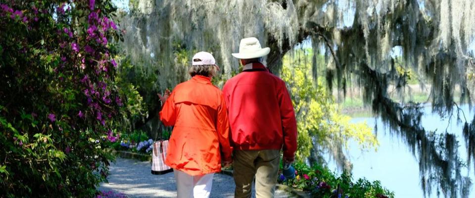 Elderly couple in  Magnolia Plantation and Gardens, Charleston, South Carolina, US