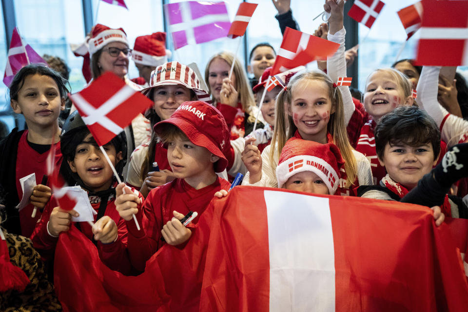 Elementary school children attend an event to send off the Danish national soccer team on their journey to the World Cup in Qatar, from the Vilhelm Lauritzen Terminal in Copenhagen, Denmark, Tuesday, Nov. 15, 2022. (Ida Marie Odgaard/Ritzau Scanpix via AP)