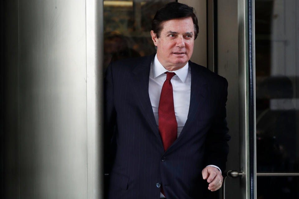 FILE - In this file photo taken on Monday, Nov. 6, 2017, Paul Manafort, President Donald Trump's former campaign chairman, leaves the federal courthouse in Washington. Russian state television stations have jumped at what they perceive as a relatively mild sentence handed to former Trump campaign chairman Paul Manafort, saying it is proof that U.S. special counsel Robert Mueller's investigations have failed to prove Trump's collusion with Russia. (AP Photo/Jacquelyn Martin, File)