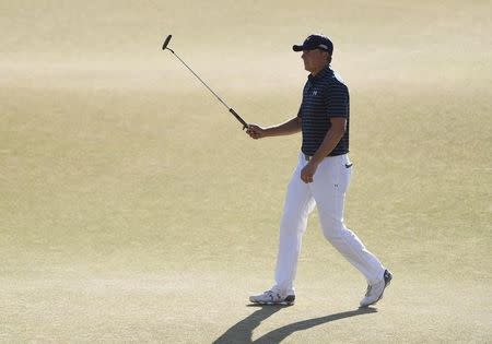 Jun 21, 2015; University Place, WA, USA; Jordan Spieth waves to the crowd on the 18th green in the final round of the 2015 U.S. Open golf tournament at Chambers Bay. Mandatory Credit: Kyle Terada-USA TODAY Sports