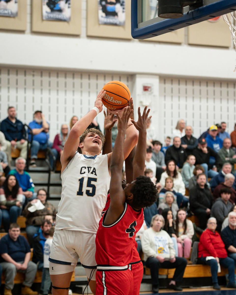 Central Vally Academy's Deacon Judd shoots the ball Friday against then Syracuse Academy of Science.