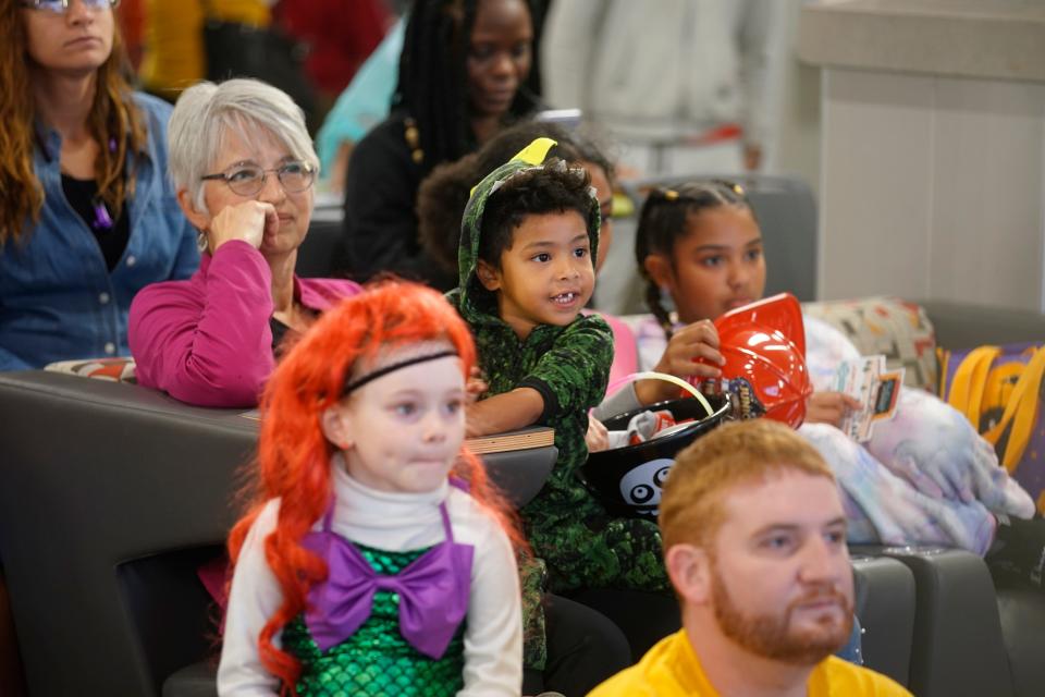 Children eagerly watch a science demonstration at Tech or Treat at  Gateway Innovation and Discovery in Tuscaloosa, Ala. on Thursday, Oct. 24, 2019. [Photo/Jake Arthur]