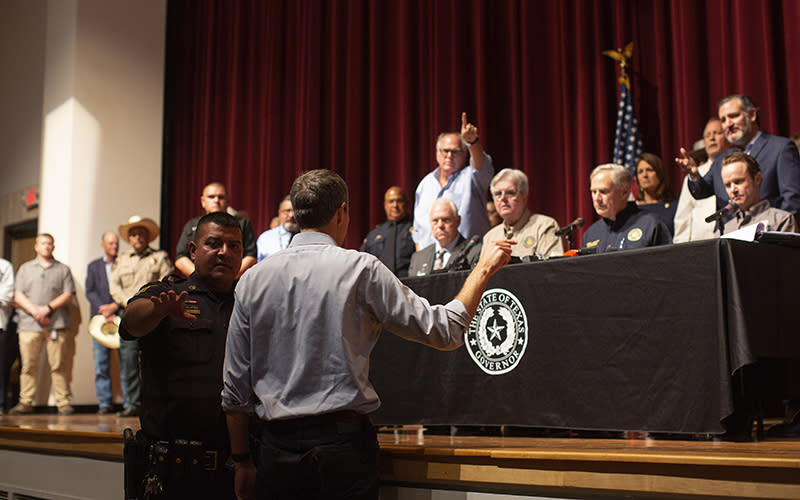 Beto O'Rourke gestures at Greg Abbott as he interrupts Abbotts' news conference on the Uvalde school shooting