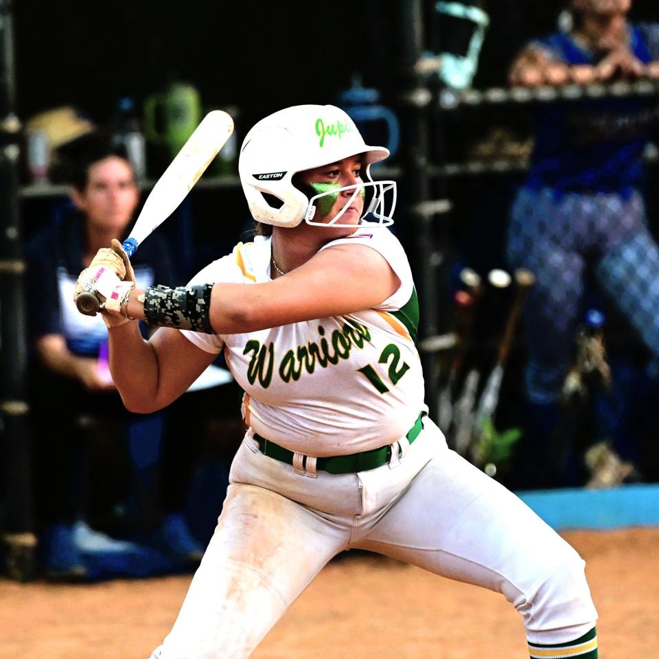 Jupiter's Sasha Seidel winds up at the plate for a big swing during a regional semifinals game against Wellington on May 14, 2024.