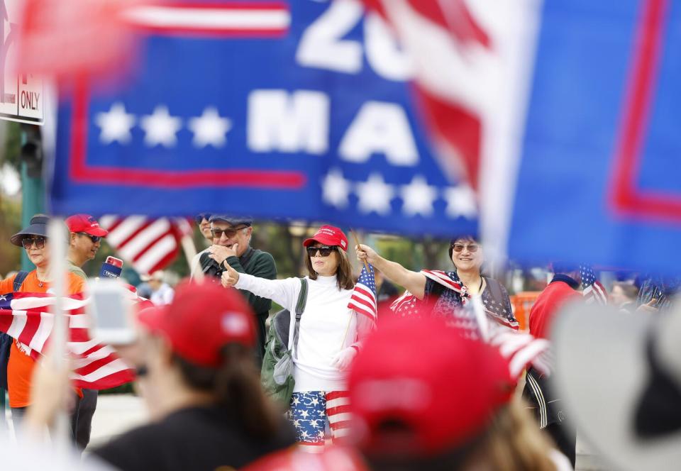 Trump supporters gather at the entrance to the California Republican Party Convention at the Anaheim Marriott Hotel.