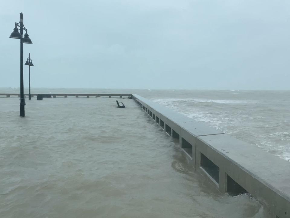 View of the Key West pier flooded as Hurricane Ian approaches, in Key West, Florida, U.S., September 27, 2022, in this screen grab taken from a social media video.