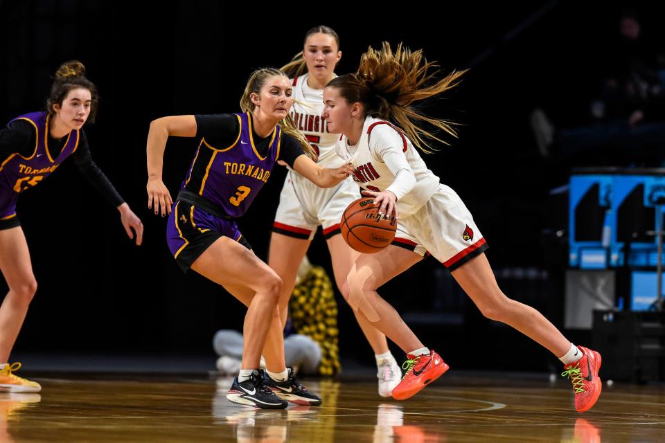 Arlington's Addalyn Steffensen (3) drives to the basket against Centerville's Althea Gust (3) during the state B girls basketball championship on Saturday, March 9, 2024 in the Summit Arena at The Monument in Rapid City.