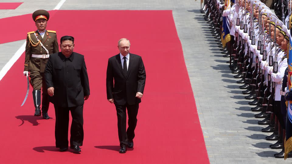 Russian President Vladimir Putin (R) and North Korean Supreme Leader Kim Jong Un attend a welcoming ceremony on June 19, 2024 in Pyongyang, North Korea. - Stringer/Getty Images