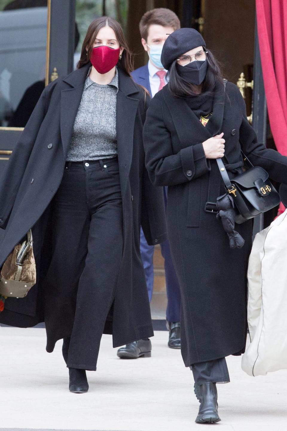 <p>Demi Moore and daughter Scout Willis leave their hotel in Paris on Tuesday during Haute Couture Paris Fashion Week.</p>