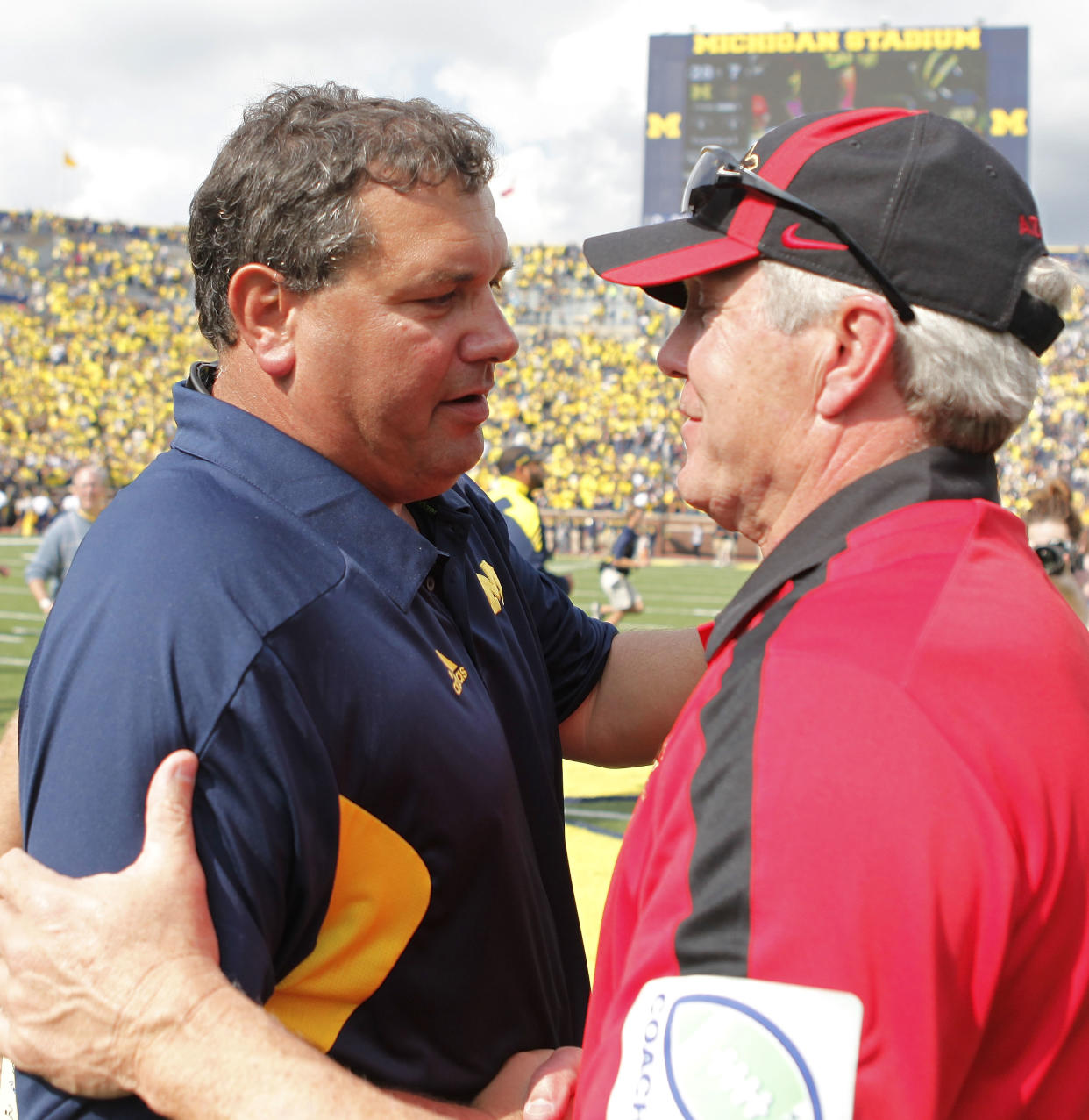 ANN ARBOR, MI - SEPTEMBER 24:  Michigan Wolverines head coach Brady Hoke and San Diego State's head coach Rocky Long meet on the field after the game at Michigan Stadium on September 24, 2011 in Ann Arbor, Michigan. Michigan defeated San Diego 28-7.  (Photo by Leon Halip/Getty Images)