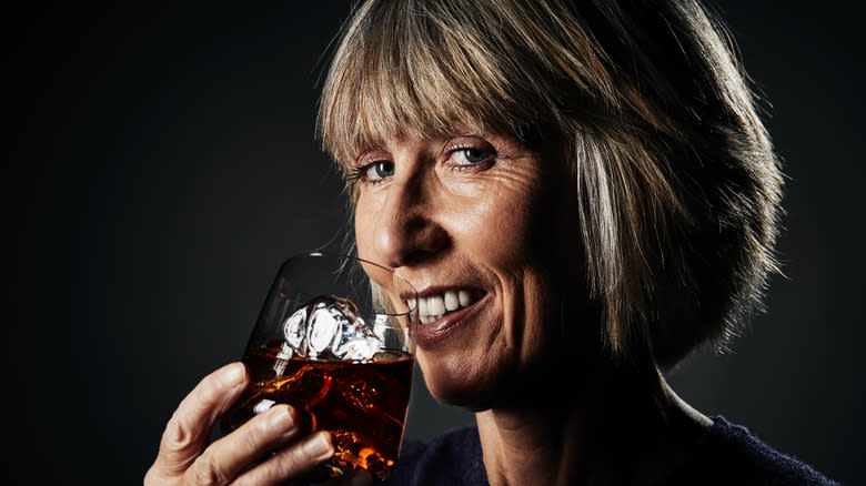 woman drinking whiskey
