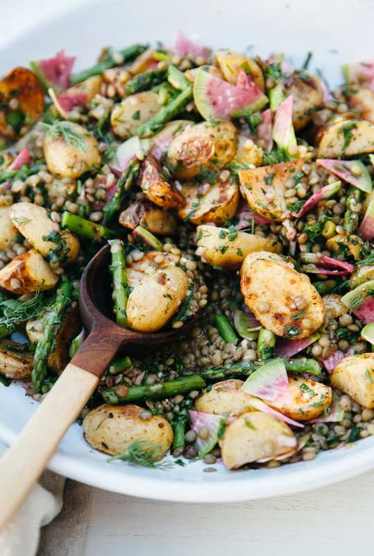 <p>The First Mess</p><p>This roasted red potato salad with lentils and spring vegetables is the perfect meal for spring!</p><p><strong>Get the recipe: <a href="https://thefirstmess.com/2017/04/19/roasted-potato-salad-lentils-spring-vegetables-recipe/" rel="nofollow noopener" target="_blank" data-ylk="slk:Roasted Red Potato Salad with Lentils and Spring Vegetables;elm:context_link;itc:0;sec:content-canvas" class="link rapid-noclick-resp">Roasted Red Potato Salad with Lentils and Spring Vegetables</a></strong></p>