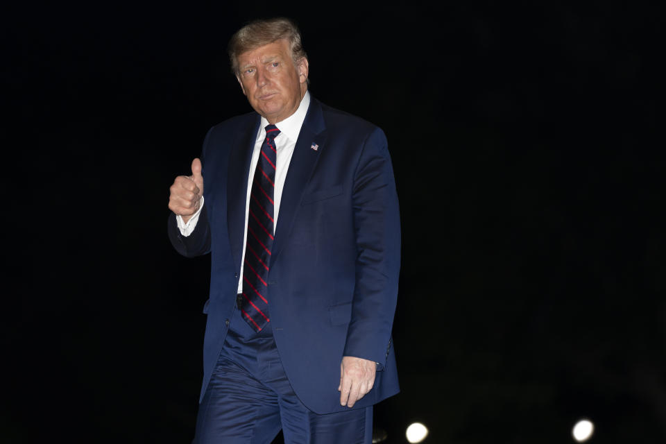 President Donald Trump gives thumbs up after stepping off Marine One on the South Lawn of the White House, Tuesday, Sept. 15, 2020, in Washington. Trump is returning from Philadelphia. (AP Photo/Alex Brandon)