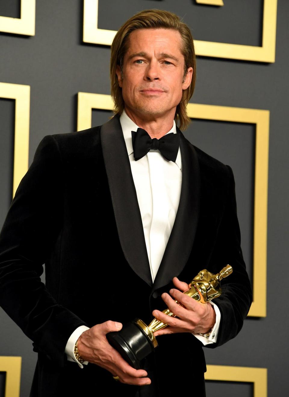 Brad Pitt wins the Oscar for best supporting actor in 2020 (PA)