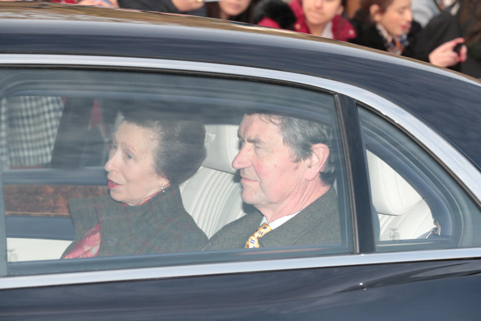 The Princess Royal and Vice Admiral Sir Tim Laurence, arrive by car for the Queen's Christmas lunch at Buckingham Palace, London.