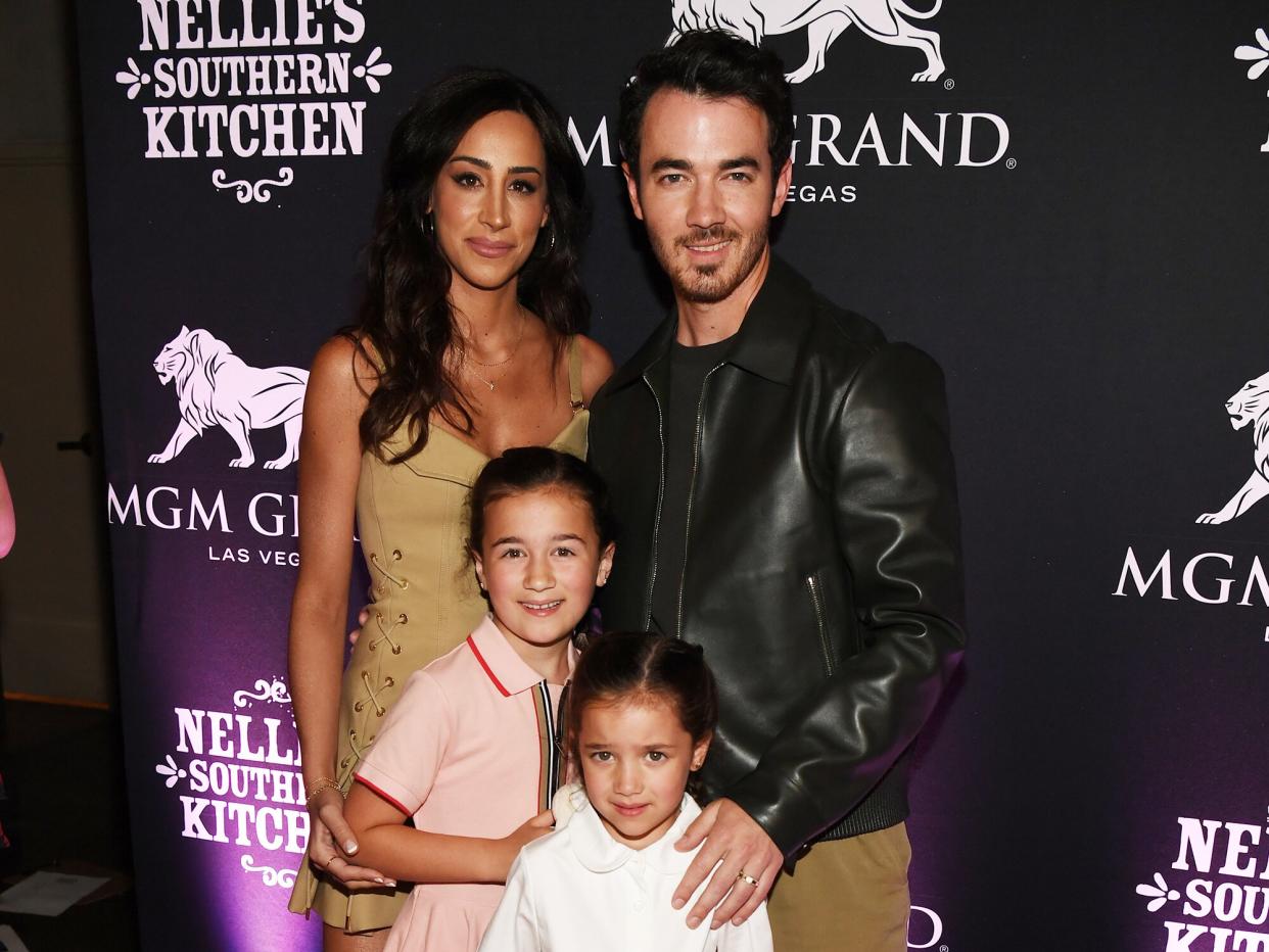 Danielle Jonas, Kevin Jonas, Alena Rose Jonas and Valentina Angelina Jonas arrive at the grand opening of their family restaurant Nellie's Southern Kitchen at MGM Grand on June 04, 2022 in Las Vegas, Nevada