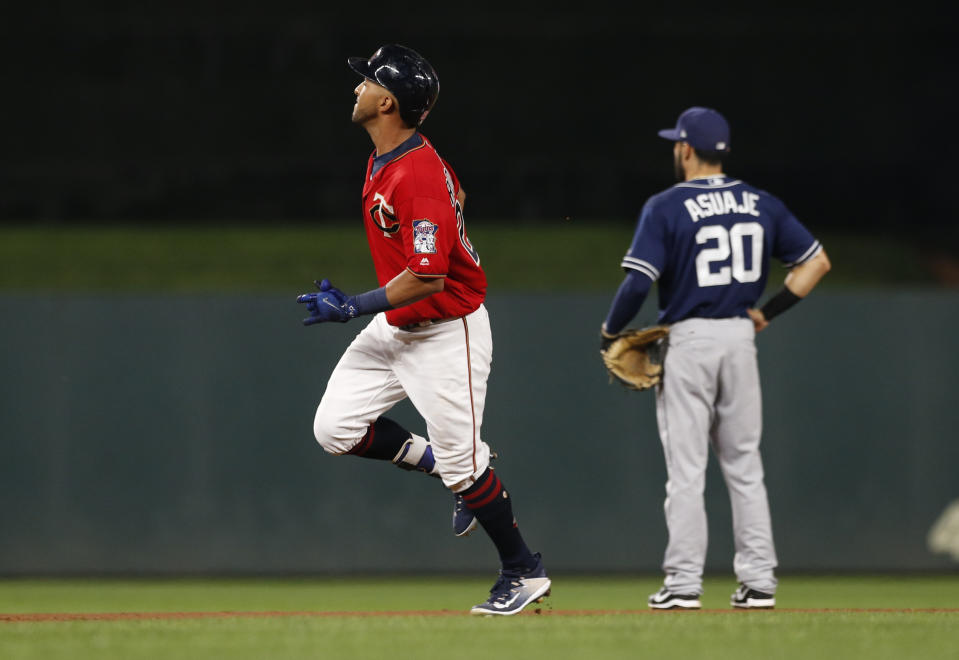 The Padres watched a lot of home runs leave the ballpark Tuesday. (AP Photo/Jim Mone)