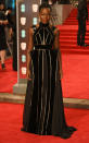 <p>The “Black Panther” actress donned a black-and-gold Elie Saab number. <em>[Photo: Getty]</em> </p>