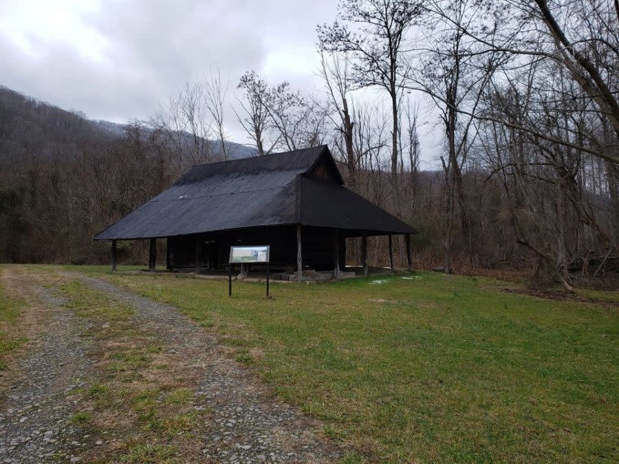 Historic Barn – Brown Gabled Barn standing behind outdoor exhibit – Photo Courtesy: New River Gorge National Park and Preserve