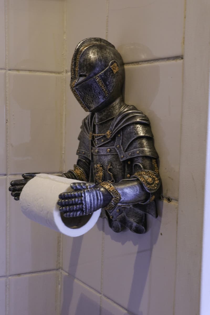 toilet paper holder in the shape of a knight