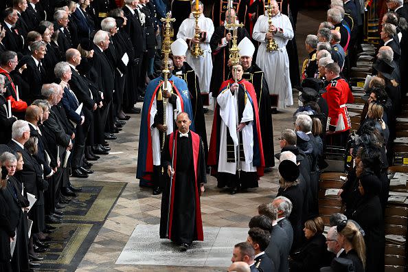 LONDON, ENGLAND - SEPTEMBER 19: A general view of members of the clergy inside Westminster Abbey during the State Funeral of Queen Elizabeth II on September 19, 2022 in London, England. Elizabeth Alexandra Mary Windsor was born in Bruton Street, Mayfair, London on 21 April 1926. She married Prince Philip in 1947 and ascended the throne of the United Kingdom and Commonwealth on 6 February 1952 after the death of her Father, King George VI. Queen Elizabeth II died at Balmoral Castle in Scotland on September 8, 2022, and is succeeded by her eldest son, King Charles III.  (Photo by Gareth Cattermole/Getty Images)