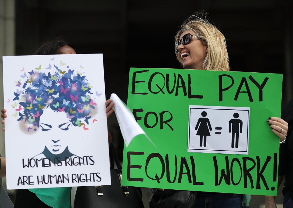 Woman marching for equal pay in Fort Lauderdale, Florida, last year. (Photo: Joe Raedle via Getty Images)