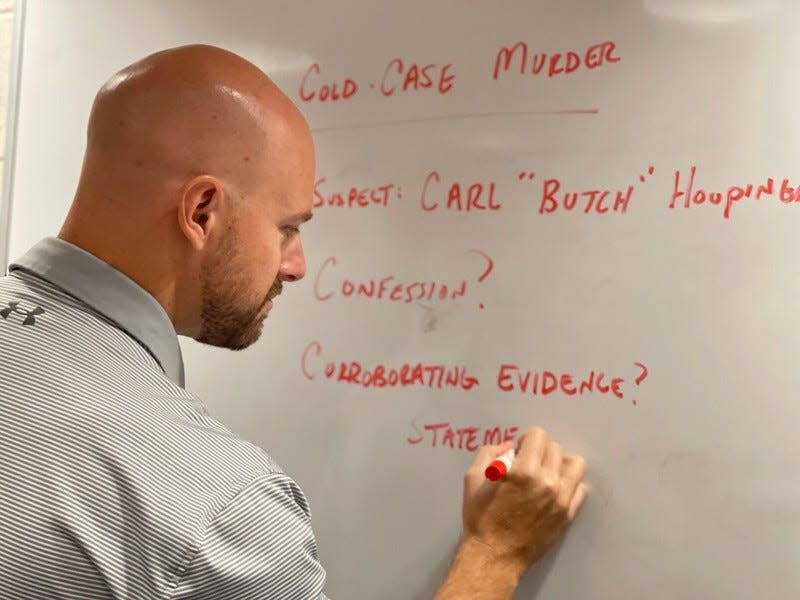 Sergeant Bill Patterson of the Guernsey County Sheriff's Office works on the 1990 James Bradley murder case, which was recently closed after a confession from Carl "Butch" Hoopingarner.