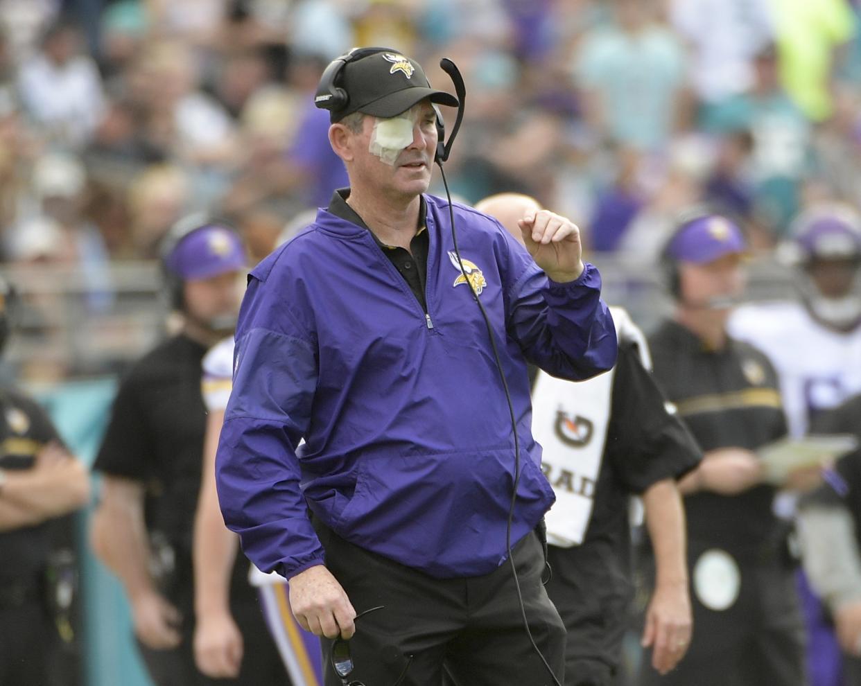 Mike Zimmer’s latest eye surgery will keep him out for the Vikings OTAs this week. (AP)