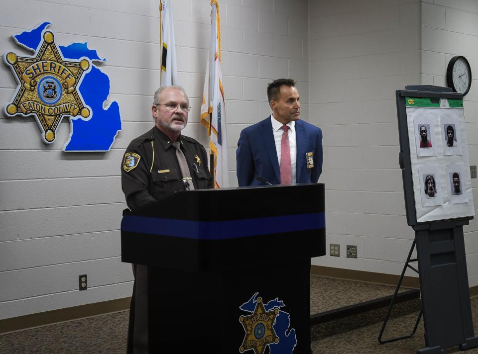 Eaton County Sheriff Tom Reich, left, speaks about a sex crimes sting operation that led to the arrests of four men in Eaton County in a Delta Township motel in November and December. The department partnered with Genesee County Sheriff Chris Swanson's operation GHOST (Genesee Human Oppression Strike Team) team, which targets child sexual abusers and human traffickers.