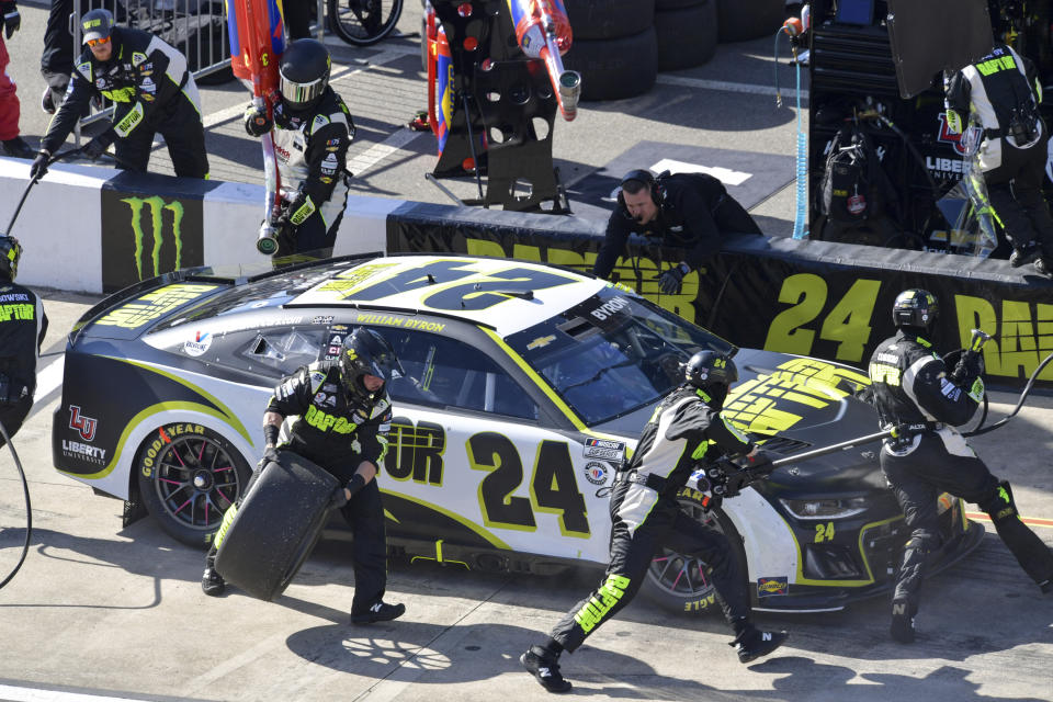 William Byron (24) completes a pit stop during a NASCAR Cup Series auto race at Richmond Raceway on Sunday, April 2, 2023, in Richmond, Va. (AP Photo/Mike Caudill)