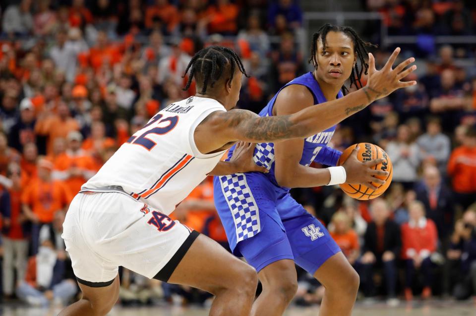 Jan 22, 2022; Auburn, Alabama, USA;  Auburn Tigers guard Allen Flanigan (22) pressures Kentucky Wildcats guard TyTy Washington Jr. (3) during the first half at Auburn Arena. Mandatory Credit: John Reed-USA TODAY Sports