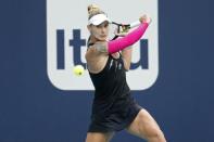 Mar 24, 2019; Miami Gardens, FL, USA; Polona Hercog of Slovenia hits a backhand against Simona Halep of Romania (not pictured) in the third round of the Miami Open at Miami Open Tennis Complex. Mandatory Credit: Geoff Burke-USA TODAY Sports