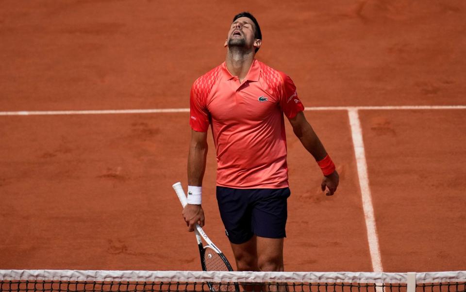 Serbia's Novak Djokovic reacts after missing a shot against Spain's Carlos Alcaraz during their semifinal match of the French Open - P Photo/Christophe Ena