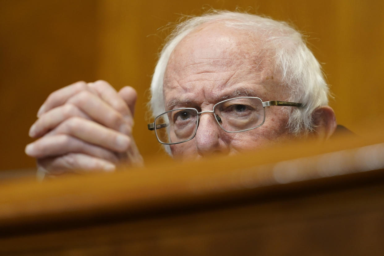 Senate Budget Committee Chairman Sen. Bernie Sanders, I-Vt., listens during a hearing on Capitol Hill in Washington, Thursday, Feb. 25, 2021, examining wages at large profitable corporations. (AP Photo/Susan Walsh, Pool)