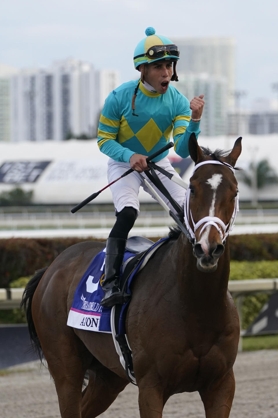 Jockey Irad Ortiz, Jr. reacts aboard Atone after winning the Pegasus World Cup Turf Invitational horse race, Saturday, Jan. 28, 2023, at Gulfstream Park in Hallandale Beach, Fla. (AP Photo/Lynne Sladky)