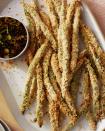 <p>We set out to make crispy delicious tempura <a href="https://www.delish.com/cooking/a23089260/how-to-cook-green-beans/" rel="nofollow noopener" target="_blank" data-ylk="slk:green beans" class="link ">green beans</a> minus the deep frying. Our solve? Panko bread crumbs, which give the benefit of tempura's delicious crunch, without the need for a pot of hot, spattering oil or a <a href="https://www.delish.com/cooking/recipe-ideas/a31750708/tempura-batter-recipe/" rel="nofollow noopener" target="_blank" data-ylk="slk:classic tempura batter" class="link ">classic tempura batter</a> (since wet batters don't do well in the air fryer).</p><p>Get the <strong><a href="https://www.delish.com/cooking/recipe-ideas/a39721263/air-fryer-tempura-recipe/" rel="nofollow noopener" target="_blank" data-ylk="slk:Air Fryer Tempura-Inspired Green Beans recipe" class="link ">Air Fryer Tempura-Inspired Green Beans recipe</a></strong>.</p>