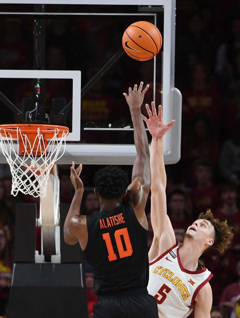 Iowa State forward Aljaz Kunc(5) attempts to block as Oregon State forward Warith Alatishe(10) takes a shot during the second half at Hilton Coliseum Friday, Nov. 12, 2021, in Ames, Iowa.