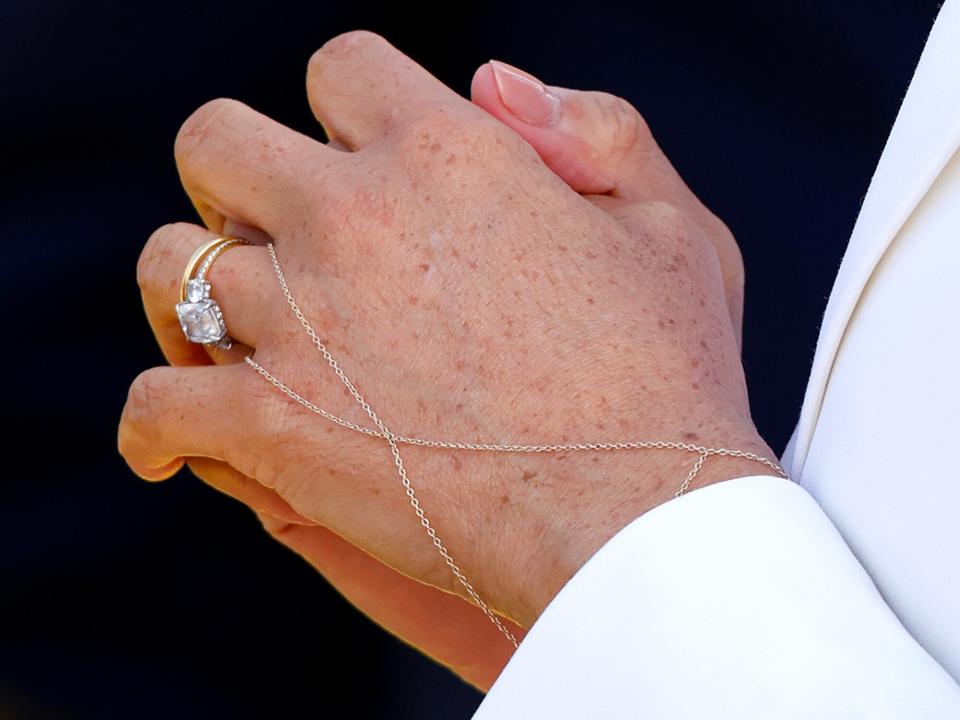 Meghan, Duchess of Sussex (jewellery detail) attends an Invictus Games Friends and Family reception hosted by the City of The Hague and the Dutch Ministry of Defence at Zuiderpark on April 15, 2022 in The Hague, Netherlands