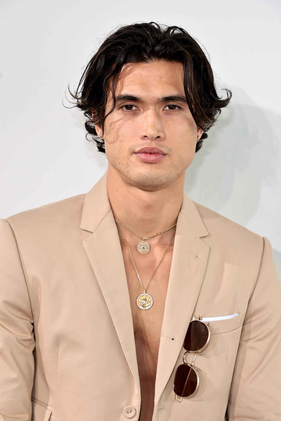 A closeup of Charles Melton