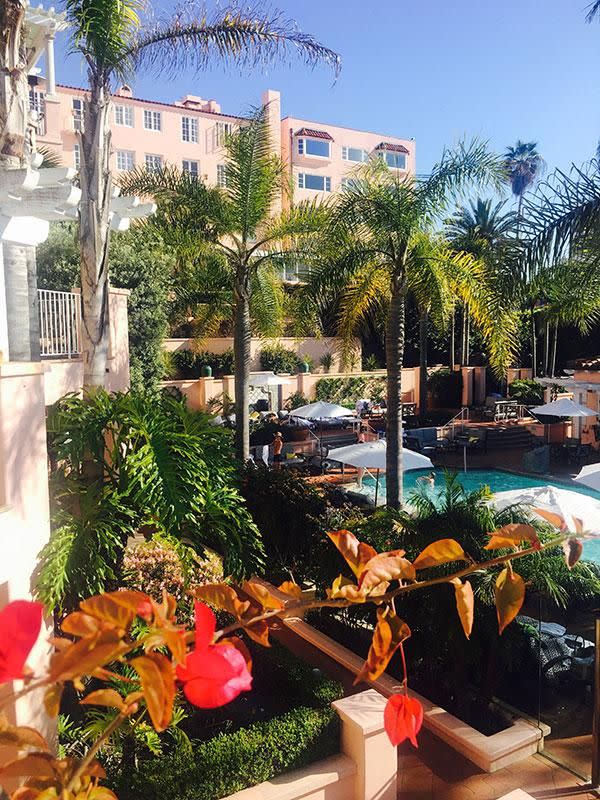 The centerpiece pool with scattered bursts of vibrant bougainvillea. Photo: Be