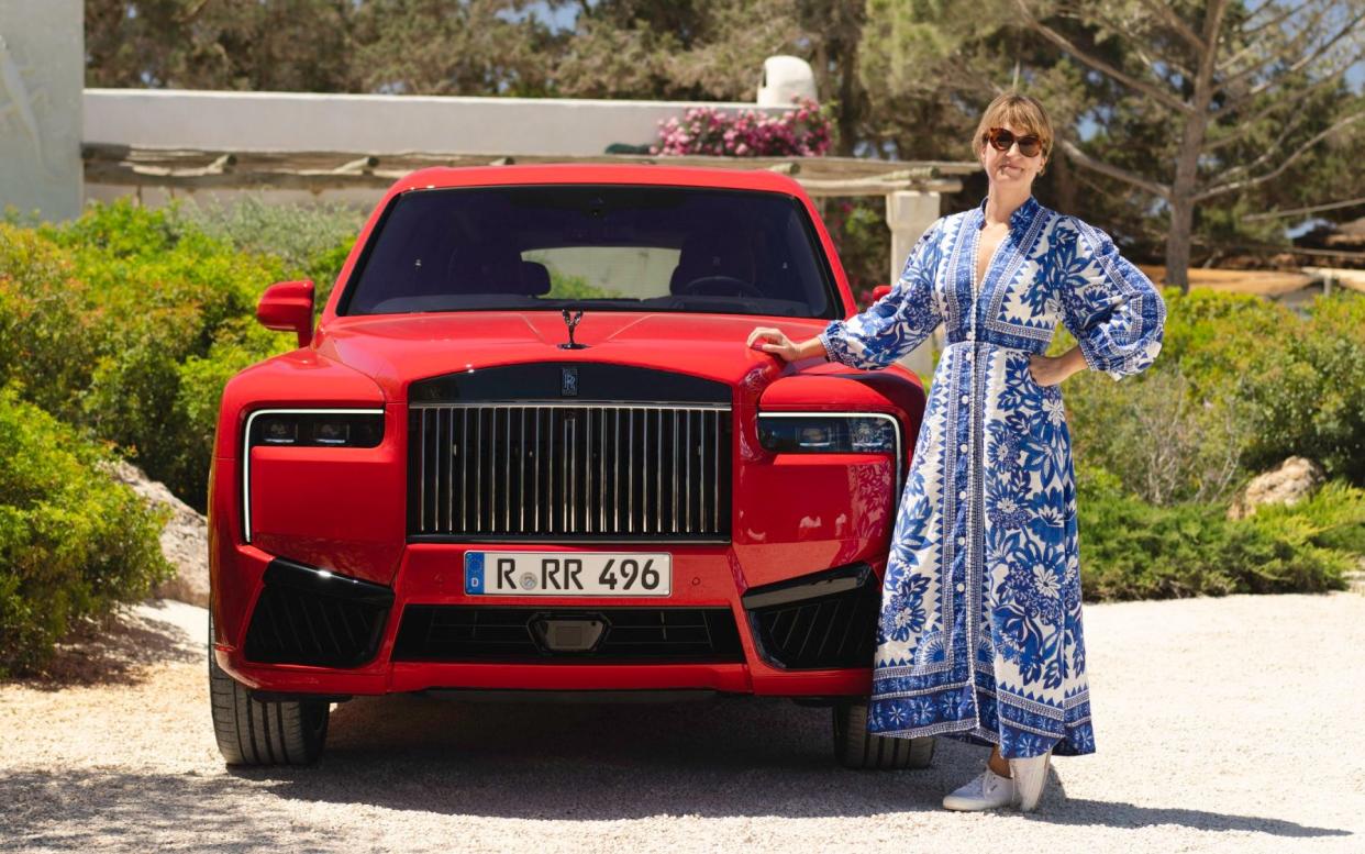 Sophia Money-Coutts with a Rolls-Royce Cullinan, which starts at £275,000