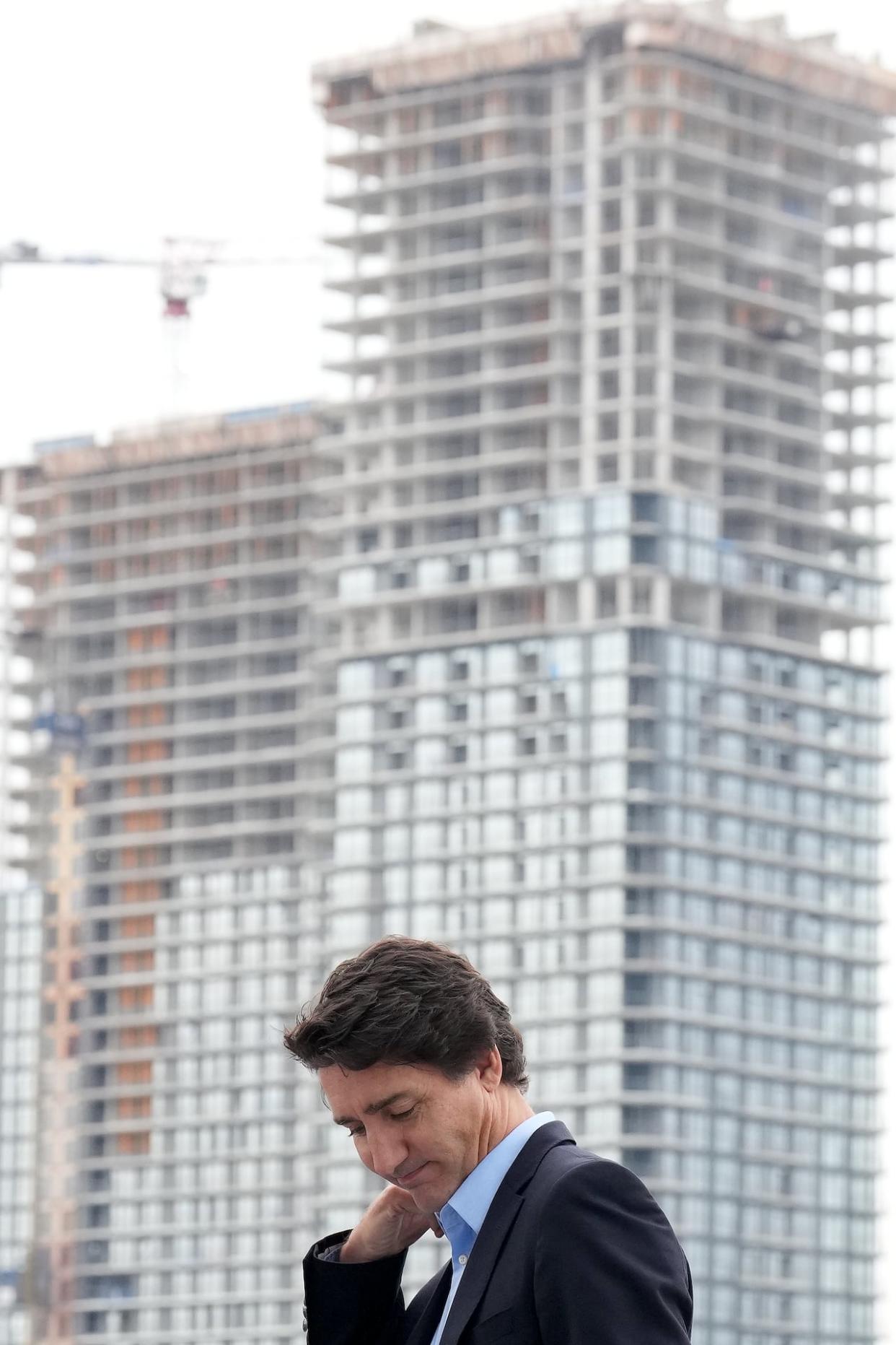 New construction is seen behind Prime Minister Justin Trudeau during a housing announcement in Vaughan, Ont. on Thursday, Oct. 5, 2023.  (The Canadian Press/Nathan Denette - image credit)