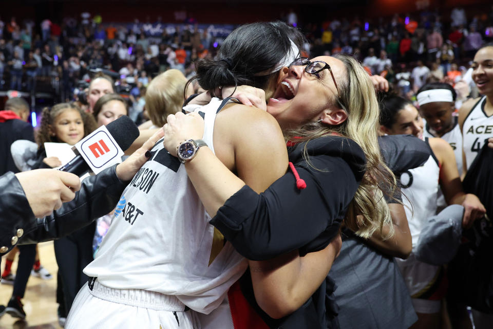 A'ja Wilson of the Las Vegas Aces celebrates with head coach Becky Hammon after defeating the Connecticut Sun in game four to win the 2022 WNBA Finals.<span class="copyright">Maddie Meyer—Getty Images</span>