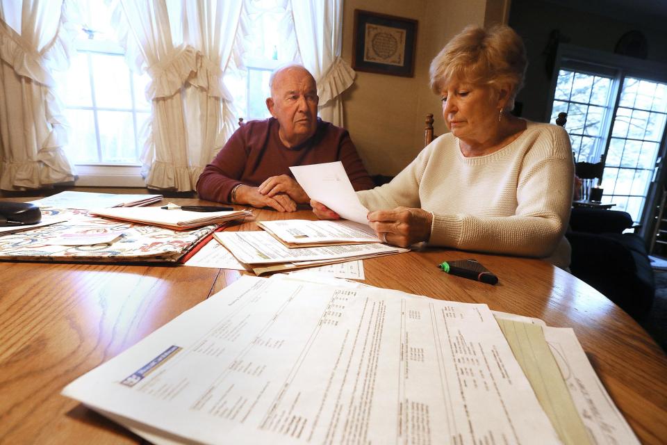 Bertram "Buzz" and Carol Palk of Whipanny talk about their difficult experiences after they were removed from a cruise ship in Mexico due to a problem with Carol's health. They are at their kitchen table on January 25, 2019 with papers and bills accrued on their trip.