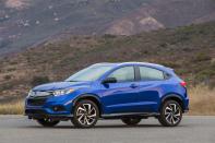 <p><a rel="nofollow noopener" href="https://www.caranddriver.com/honda/hr-v" target="_blank" data-ylk="slk:The 2019 Honda HR-V;elm:context_link;itc:0;sec:content-canvas" class="link ">The 2019 Honda HR-V</a> is a Honda through and through. It's nothing flashy, yet it delivers solid fuel economy and a level of practicality that’s nearly unmatched in the subcompact SUV segment. Some of the credit goes to the HR-V's multi-function rear seat-borrowed from the Fit hatchback-that makes the most out of the interior cabin space through its multitude of seat-folding options. There also is the 1.8-liter engine that delivers up to 30 mpg combined in both front- and all-wheel drive configurations; efficiency parity between two- and four-wheel-drive vehicle variants is rare.</p>