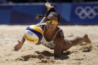 Anastasija Kravcenoka, of Latvia, dives for the ball during a women's beach volleyball Bronze match against Switzerland at the 2020 Summer Olympics, Friday, Aug. 6, 2021, in Tokyo, Japan. (AP Photo/Felipe Dana)