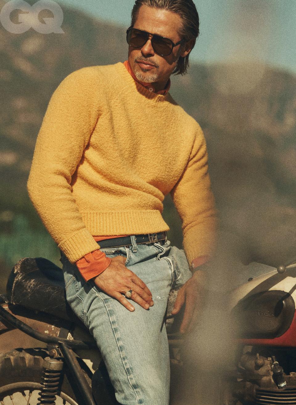 <cite class="credit">Sweater, $441, by Holiday Boileau / Shirt, $300, by Boglioli / Jeans, $198, by Levi’s Authorized Vintage / Belt, $495, by Artemas Quibble / Sunglasses, (vintage) $150, by Ray-Ban from RTH / Ring (throughout), $2,700, by David Yurman</cite>