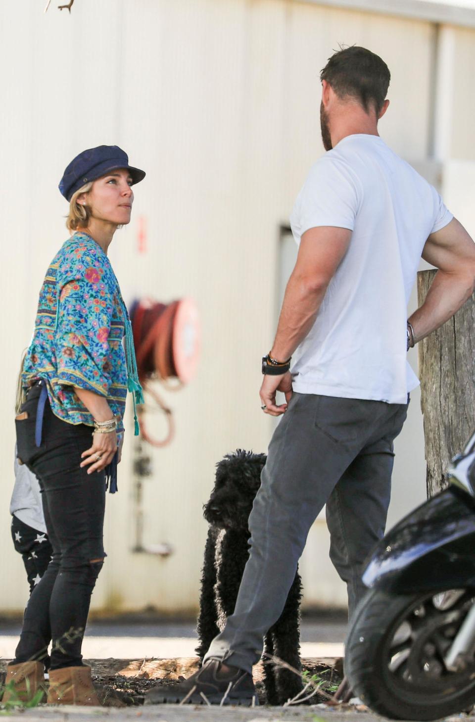 The Spanish model channelled a boho-chic look while Chris looked casual in a white t-shirt and grey jeans.