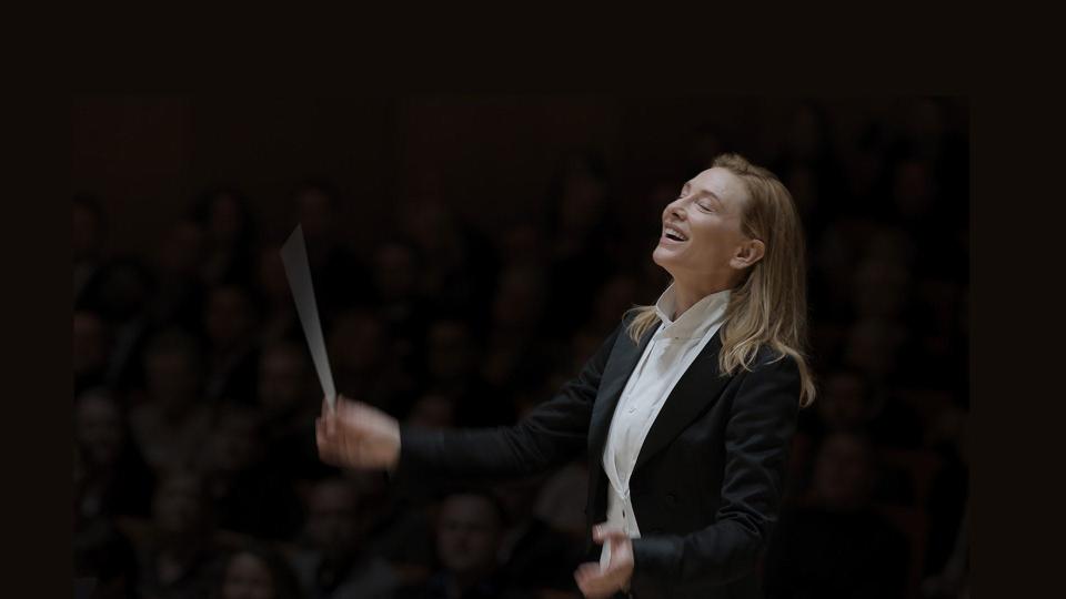 Cate Blanchett as a conductor of an orchestra