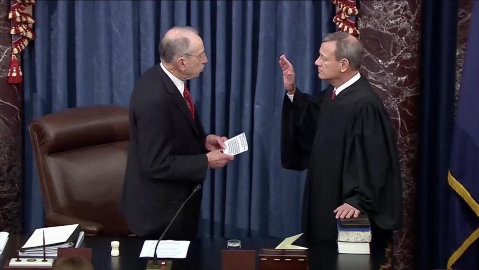 Sen. Chuck Grassley swears in Supreme Court Chief Justice John Roberts. (Screengrab: via Yahoo News Video)